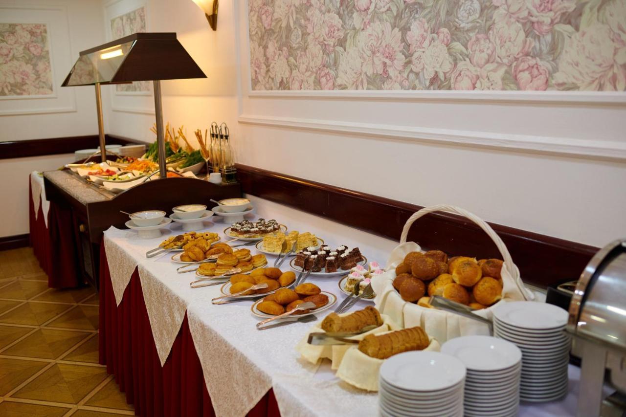 Grand Hotel Victory Ακτάου Εξωτερικό φωτογραφία A buffet
