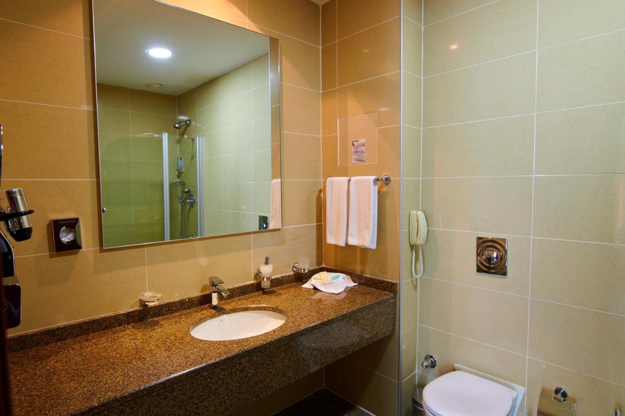Grand Hotel Victory Ακτάου Εξωτερικό φωτογραφία Bathroom