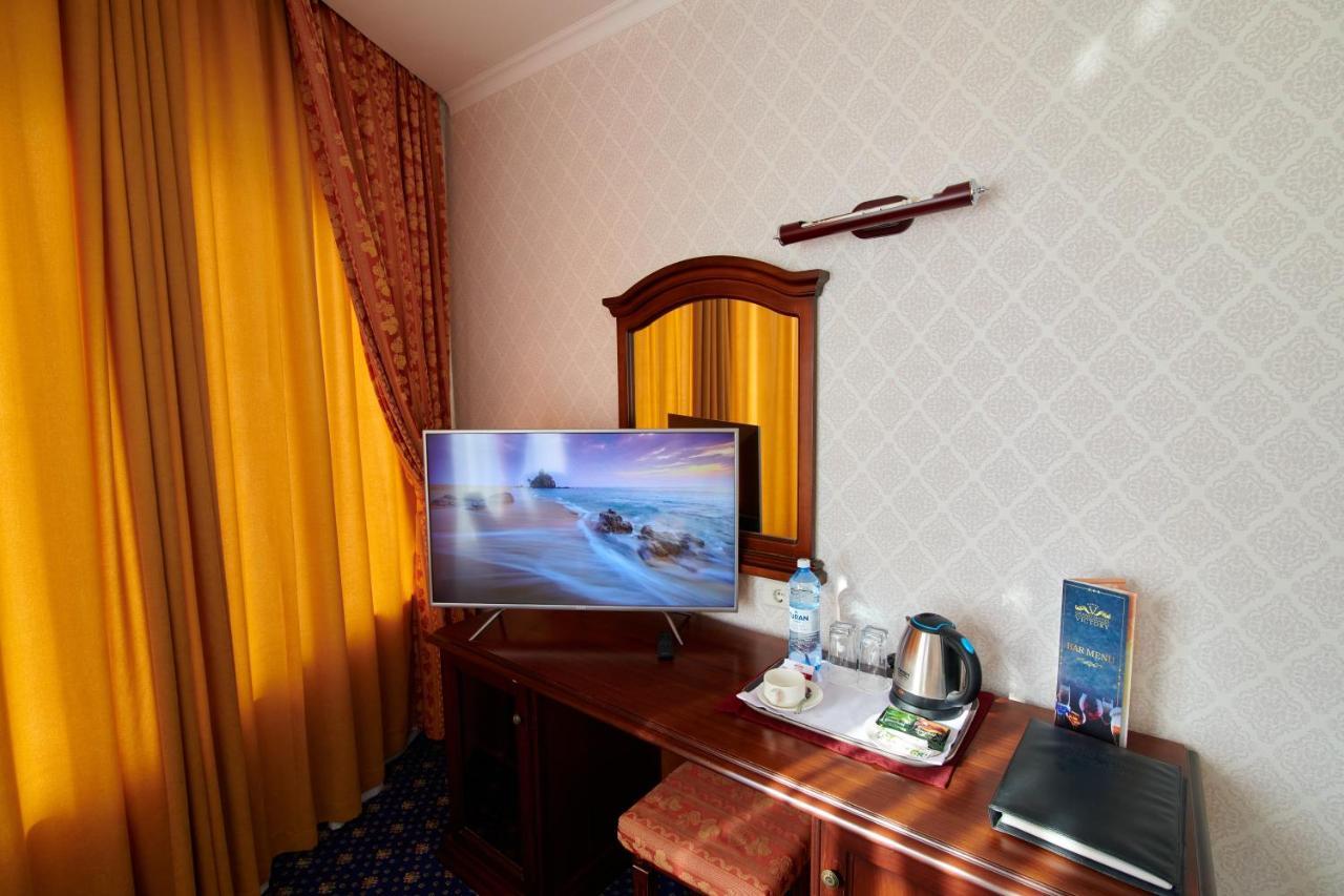 Grand Hotel Victory Ακτάου Εξωτερικό φωτογραφία A room at the hotel